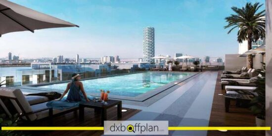 Binghatti Galaxy Apartments: Rooftop pool area with city skyline view.