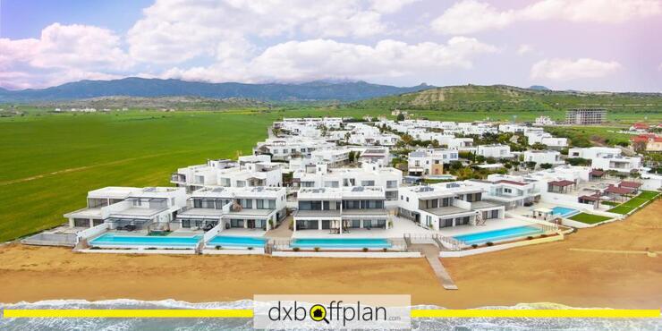 Caesar Beach Panorama: Gorgeous view of golden sands and clear waters at Caesar Beach.