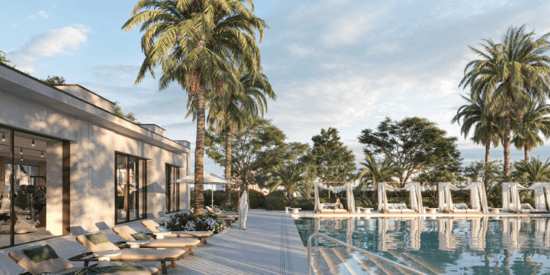 Sparkling swimming pool at Greenridge Townhouses, surrounded by lush landscaping. 