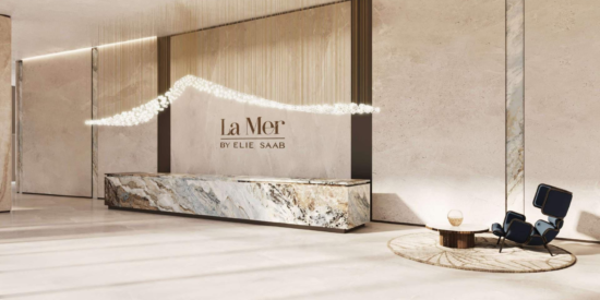 La Mer Apartments: Elegant lobby with modern decor and art.