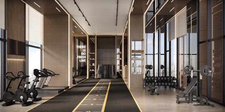 Parkway Apartments: Modern gym equipped with cardio and weights.