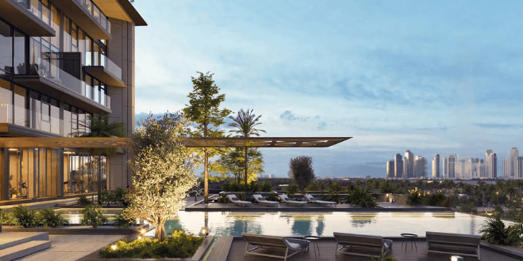 Sparkling swimming pool surrounded by modern landscaping.