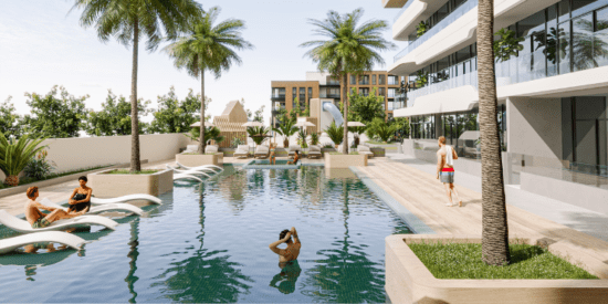 Altia One – Swimming pool surrounded by lush greenery for relaxation.