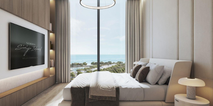 Modern bedroom with stunning sea views at Aquamarine Beach Residences.