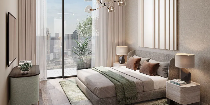 Cozy and stylish bedroom in a Marriott Residences JLT unit, designed for comfort and relaxation.