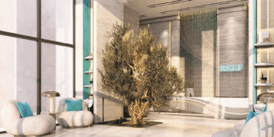 Elegant lobby entrance of Reef 999 Apartments in Dubai.