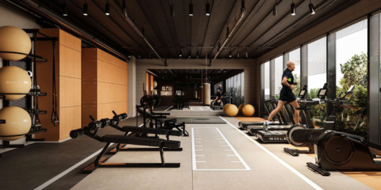 Fully equipped fitness center with modern gym equipment at The Cube Residences.