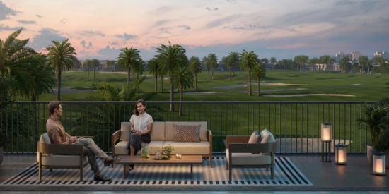 Swimming pool area at Golf Edge Apartments with lounge chairs.