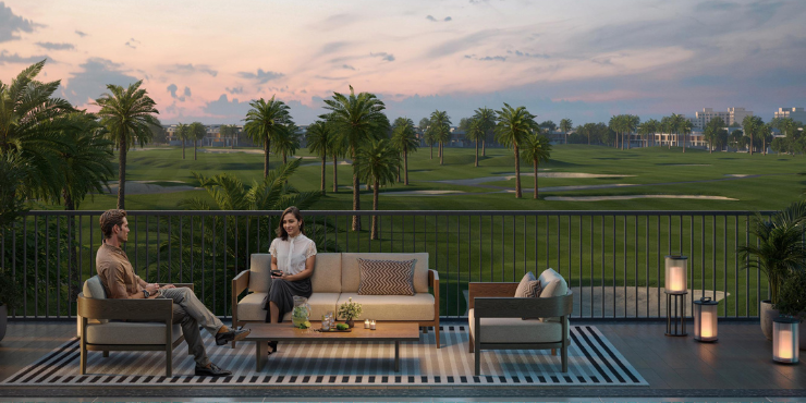 Swimming pool area at Golf Edge Apartments with lounge chairs.