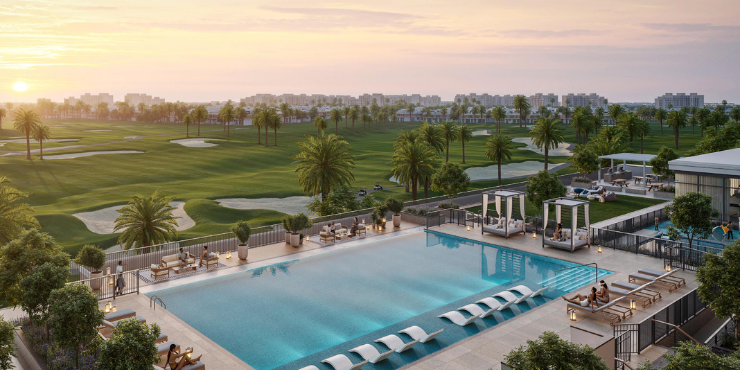 Swimming pool area at Golf Edge Apartments with lounge chairs.