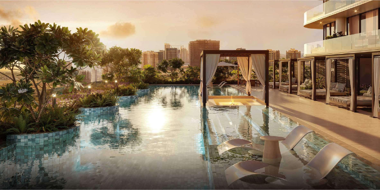 Interstellar Tower: Outdoor pool surrounded by lush landscaping.