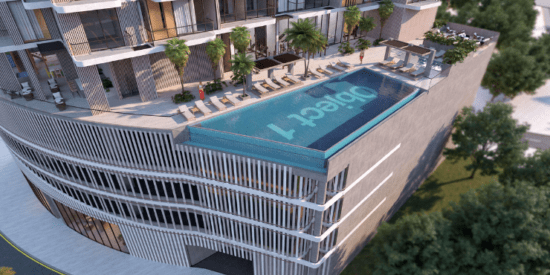 Tetris Tower JVC – Rooftop infinity pool with stunning views.