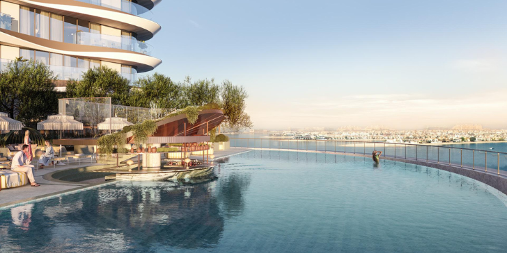 The Bristol at Emaar Beachfront infinity pool overlooking the Arabian Gulf.