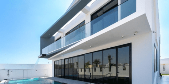 The Eighty One Villa exterior with modern architecture and garden.