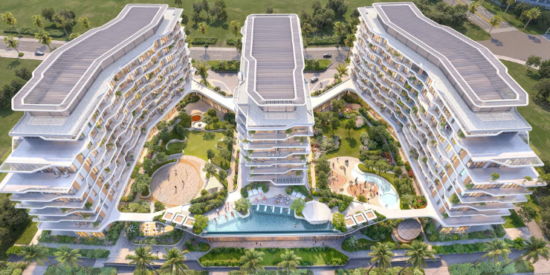 Aerial view of Flora Isle located at the heart of Dubai Islands, surrounded by lush greenery.
