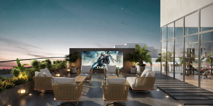 Rooftop cinema offering a unique outdoor movie experience at Oasis Lofts.