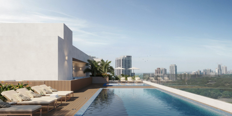 Relaxing view of the swimming pool at Oasis Lofts in Dubai Silicon Oasis.