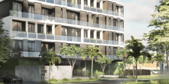 Trafford Residence exterior view with lush landscaping in Dubai South.