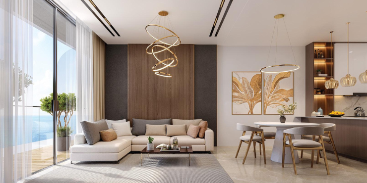 Spacious living room with floor-to-ceiling windows at Pelagia in Ras Al Khaimah.